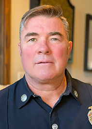 Portrait of Jason E Green