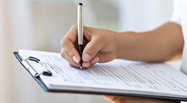 A member filling out application.