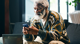Man using mobile device.