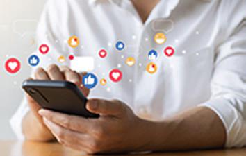 Person on their mobile device checking out social media.